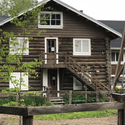 a wooden bench in front of a house