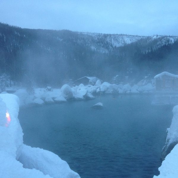 Snow-covered terrain with lake in center near Fairbanks Alaska
