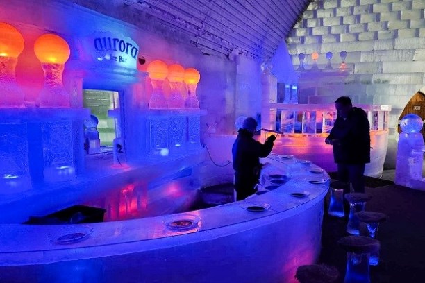 a group of people standing in front of a store