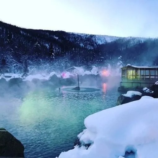 Snow-covered Chena landscape with water surrounded with rocks