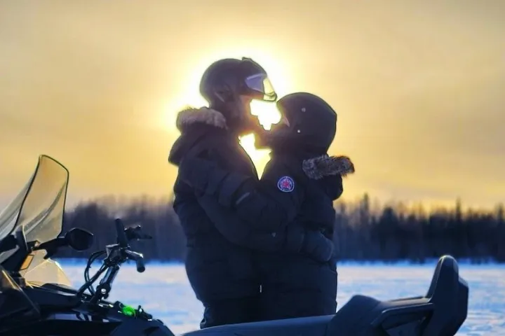 a person sitting on a boat in the water