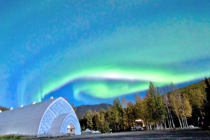 a rainbow over a body of water